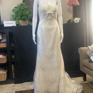 David’s bridal Galina Signature Ivory lace strapless gown.